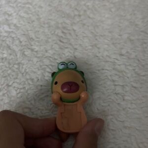 Cute Animal Figurine with Green Hat